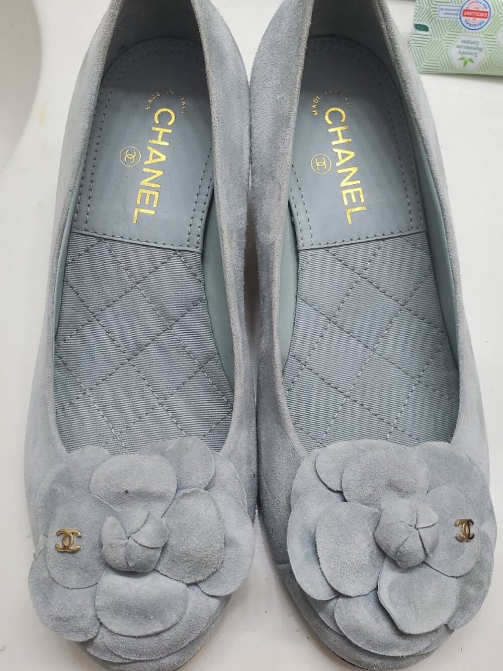 Chanel light blue suede Camellia featuring a floral accent